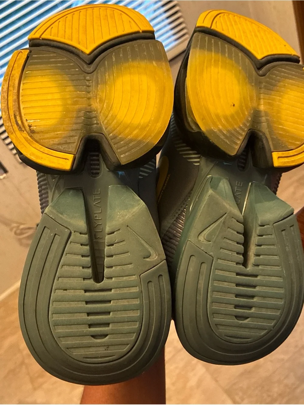 Nike Men’s Gray Athletic Shoes with Yellow Swoosh